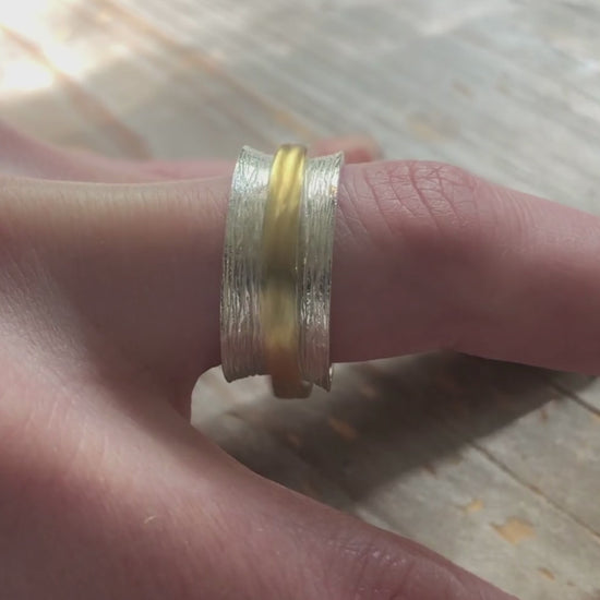 Silver spinning anxiety ring